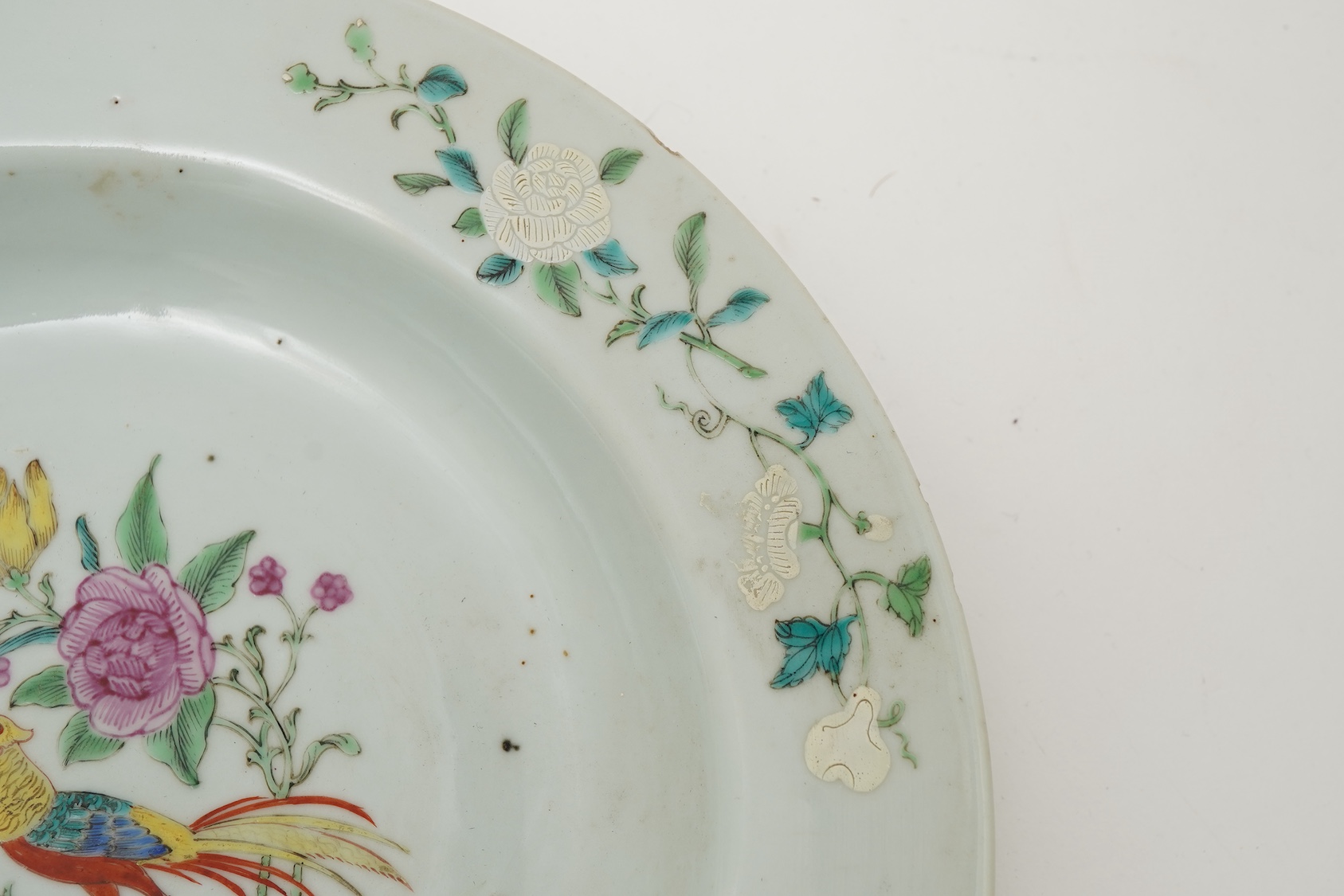 A pair of Chinese famille armorial plates, Qianlong, c.1750